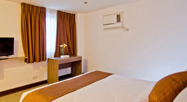 O podwyższonym standardzie dwuosobowy pokój Tyche Boutique Hotel