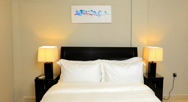 Семейные апартаменты с 2 комнатами с балконом Meilin International Hotel