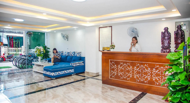 Кровать в общем номере Bin Star Hotel