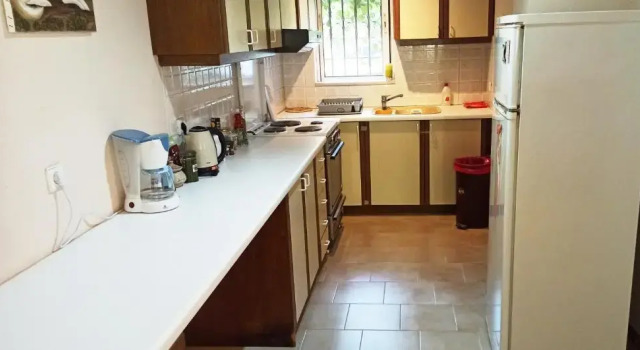Апартаменты Spacious guesthouse with garden and seaview