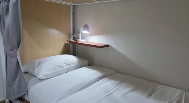 Кровать в общем номере Vintana Siam Bangkok Hotel