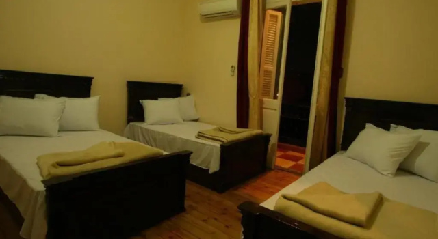 Кровать в общем номере My Hotel