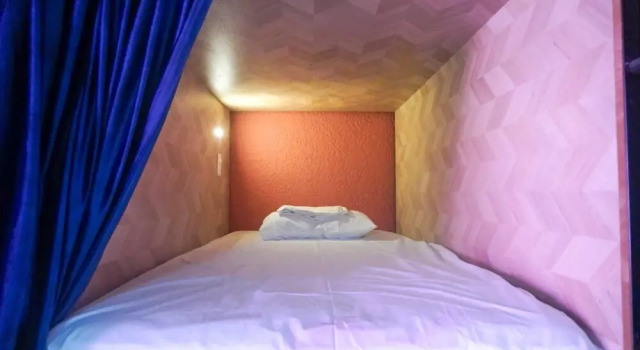 Кровать в общем номере HOSTAL CHOCOLATE CALENDA