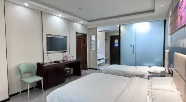 Семейный люкс Superior Jiayuguan Xinyu'an Business Hotel（Datang Food Street Shop）