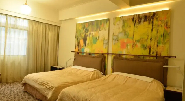 Четырёхместный номер Standard Kingship Hotel Kaohsiung Inter Continental
