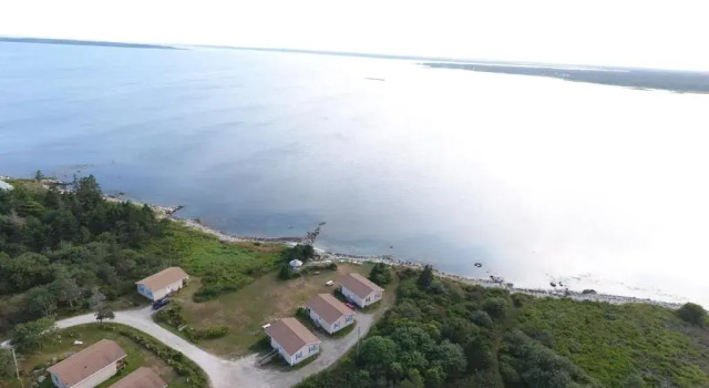 Коттедж Whispering Waves Cottages