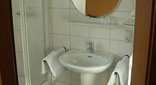Четырёхместный номер Standard Hotel & Gästehaus Im Ziegelweg KLIMATISIERT Eintrittskarten für den Europa-Park erhalten Sie garantiert über uns