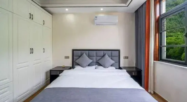 Кровать в общем номере Anji Yunshang Prairie Chidouyang Homestay (Panda Tribe Park)