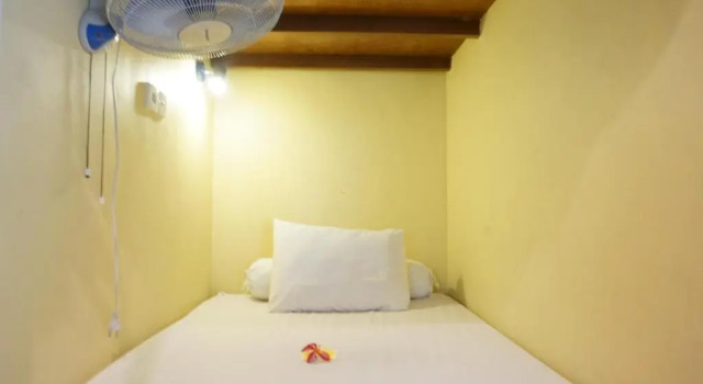 Кровать в общем номере Sila Urip Guest House