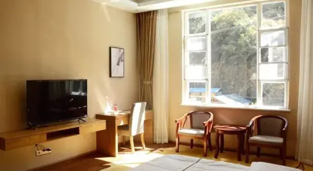 Люкс Deluxe Xinyi Hotel