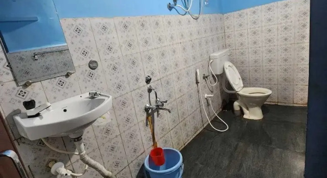 Кровать в общем номере White Water Resort dandeli
