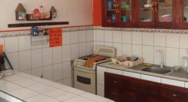 Кровать в общем номере Hostal Brisas y Olas