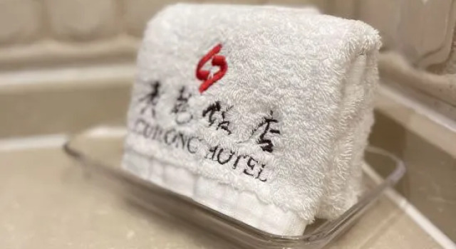 Трёхместный люкс Guilong Hotel