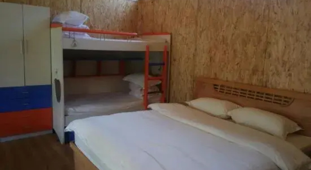 Кровать в общем номере Daniwaner Guesthouse