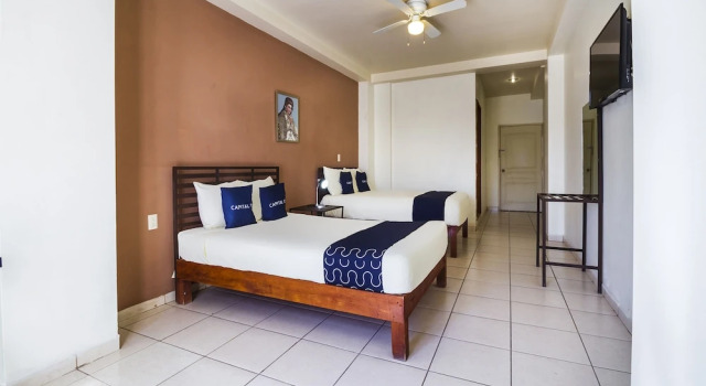 Четырёхместный номер Standard Hotel Plaza Galindo