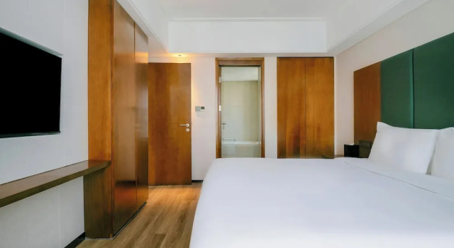 Двухместный люкс Club Lounge Access Holiday Inn Qingdao City Centre by IHG