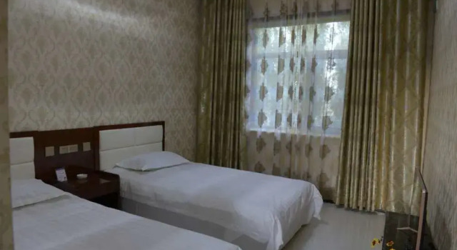 Ancient City Dragon Gate Inn, Book Hotel Jiuquan Gansu