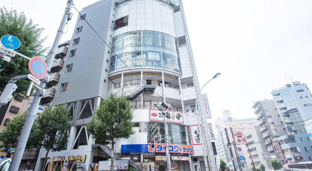 Кровать в общем номере Capsule Hotel Transit Shinjuku