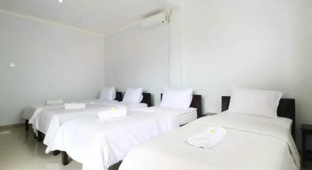 Четырёхместный номер The Wina Echo Beach Guest House