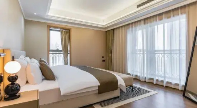 Семейный люкс Wuhan Nanjing Garden S High-altitude Hotel (Hankou Railway Station Oceanwide CBD Branch)