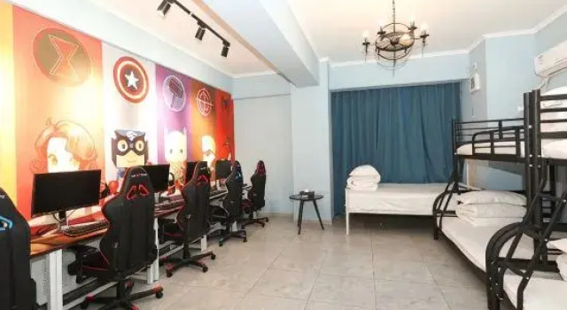 Кровать в общем номере Yunduo E-sports Hotel (Zhumadian Huanghuai College)