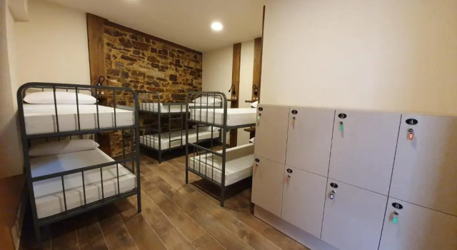 Кровать в общем номере Albergue Casa Cuartel