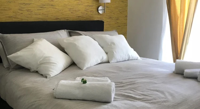 Четырёхместный номер Executive с балконом и с видом на город Terrazza Aragon Room and SPA