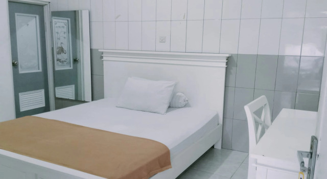 Номер Deluxe Ratu Guesthouse