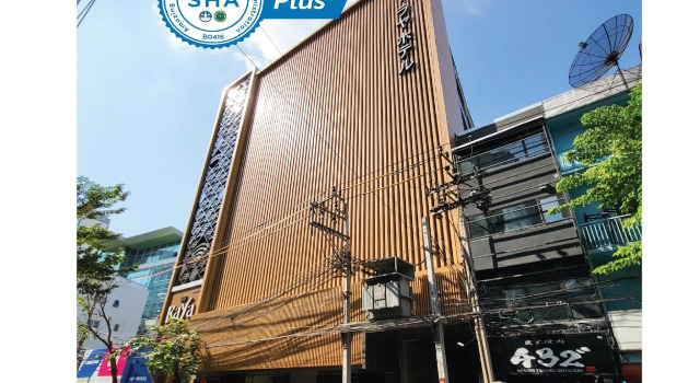 Кровать в общем номере The Raya Surawong Bangkok