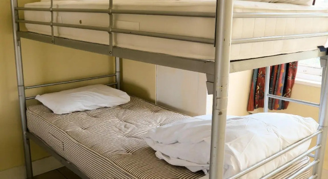 Кровать в общем номере Hotel Strand Continental - Hostel