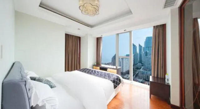 Семейный люкс с 3 комнатами с видом на море Yuelan Seaview Hotel Apartment (Qingdao May Fourth Square China Railway Center)