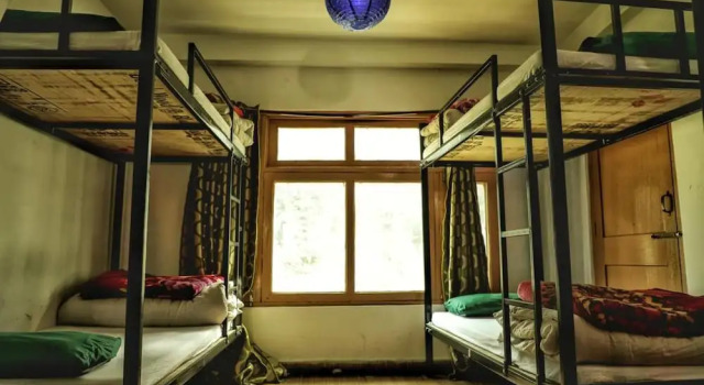 Кровать в общем номере Nomads Hostel