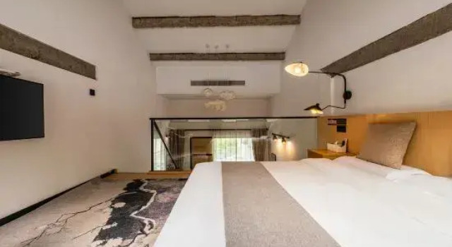 Семейный люкс с 4 комнатами HhanXia QianMo Homestay