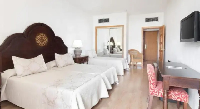 Трёхместный номер HC Hotel Magec