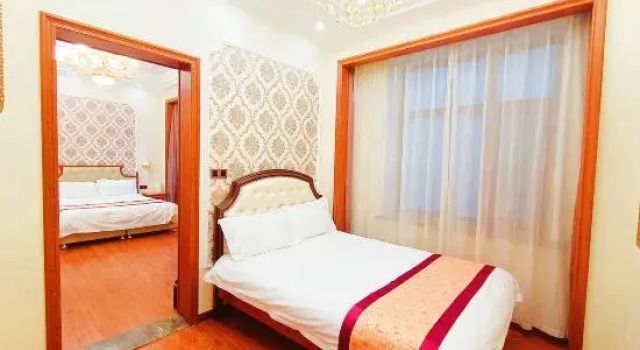 Кровать в общем номере Modern M Hotel