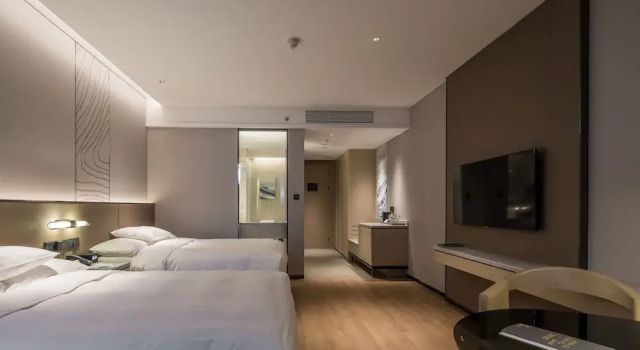 Четырёхместный номер Executive Courtyard by Marriott Changchun