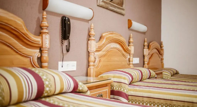Трёхместный номер Standard Hostal la Campana