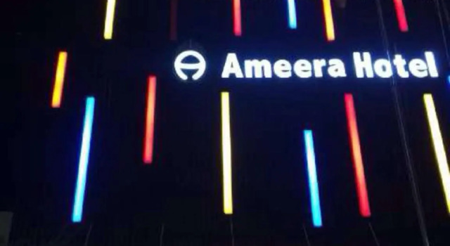 Кровать в общем номере Ameera Hotel
