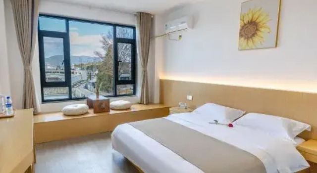 Xinhe Xiaoyuan Homestay (Lijiang High speed Railway Station)