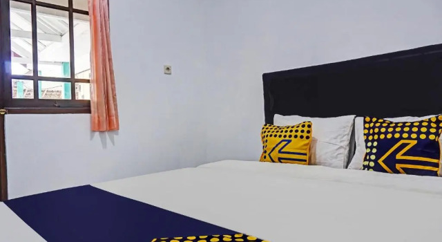 Spot On 90928 Wisma Asri Putra Syariah, Reserva ahora Hotel Hoteles en Sukaraja con aparcamiento, Aparcamiento