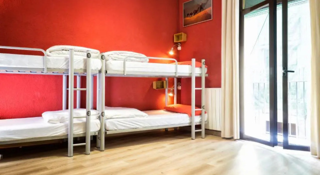 Кровать в общем номере Itaca Hostel