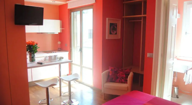 Апартаменты с 2 комнатами с балконом Bedroom La Stazione