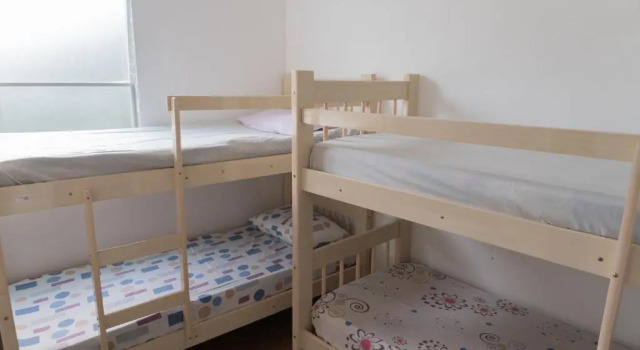 Кровать в общем номере Casa & Hospedagem Carol