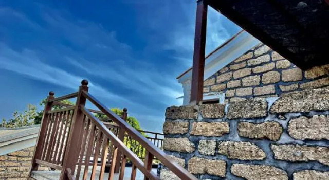 Weizhou Island Stone Yuanshe Coral Stone Homestay, Buchen Sie Hotel Hotels in Weizhou-Insel mit Parkplatz, Parkplätze