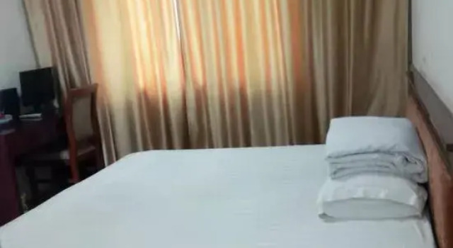 Номер Economy Yiyang Xinjia Hotel