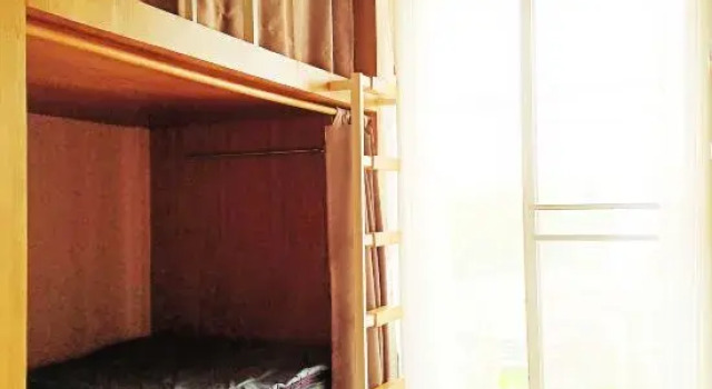Кровать в общем номере Stay In Hostel