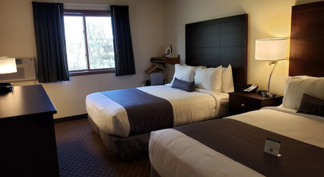 Standard Vierer Zimmer Cobblestone Inn & Suites - Merrill