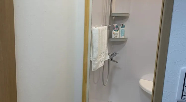 Кровать в общем номере GUEST HOUSE TOKAI nagaragawa RENTAL CAR