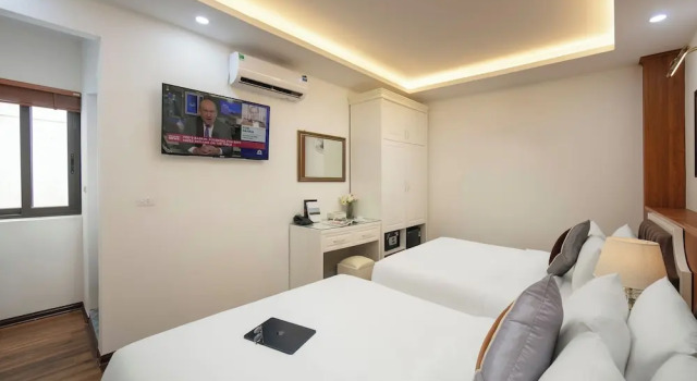 Четырёхместный семейный номер Standard TrangTrang Luxury Hotel