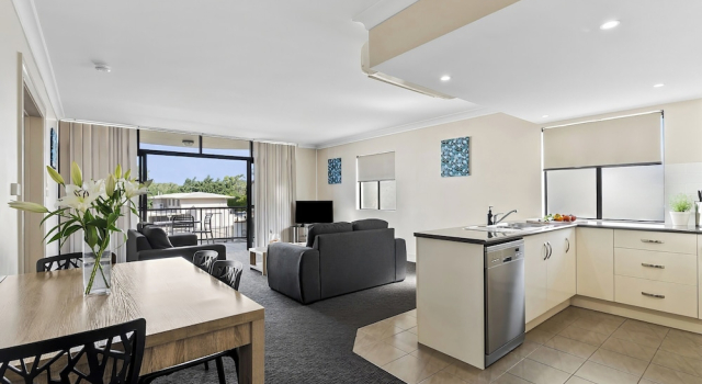 Апартаменты Deluxe Cityville Apartments & Motel
